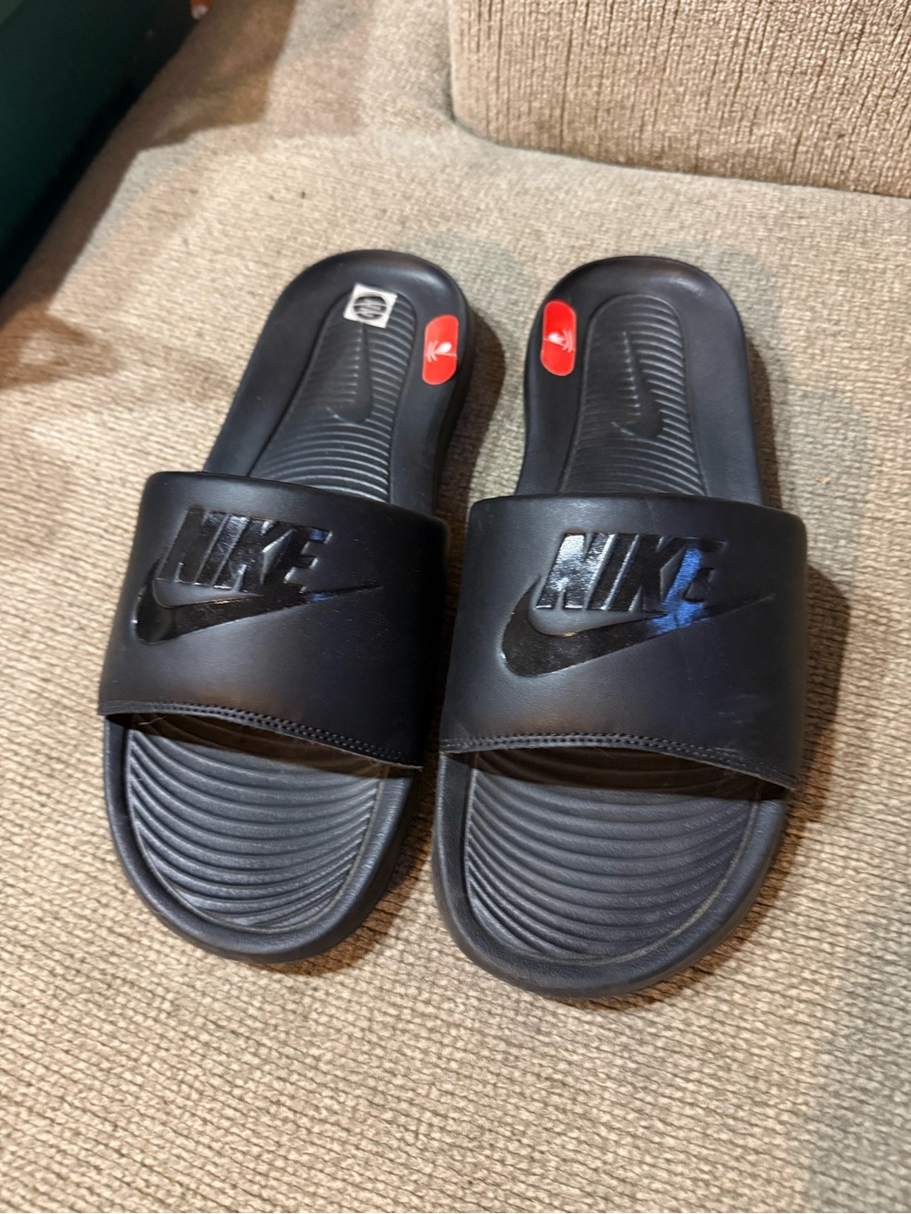 Nike Black Men's Slide Sandals with Embossed Logo